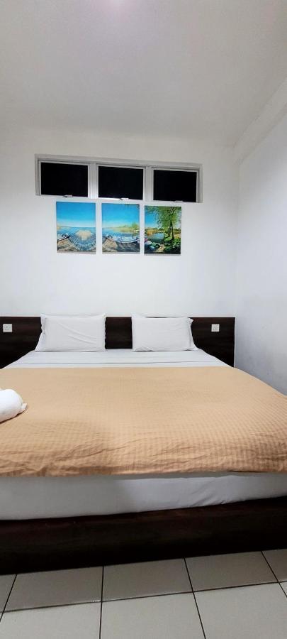 Api-Api Guesthouse كوتا كينابالو المظهر الخارجي الصورة